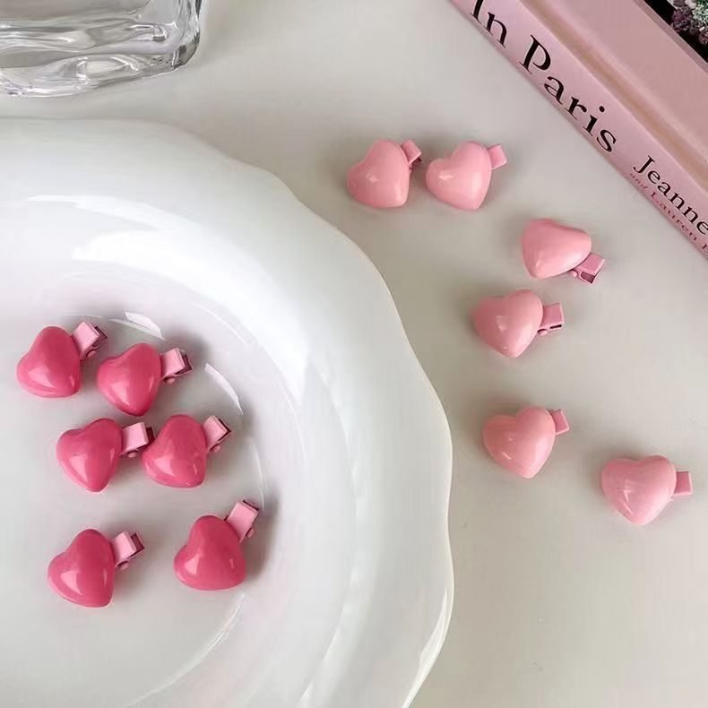 Sutyen puffy heart snap hair clips in red and pink