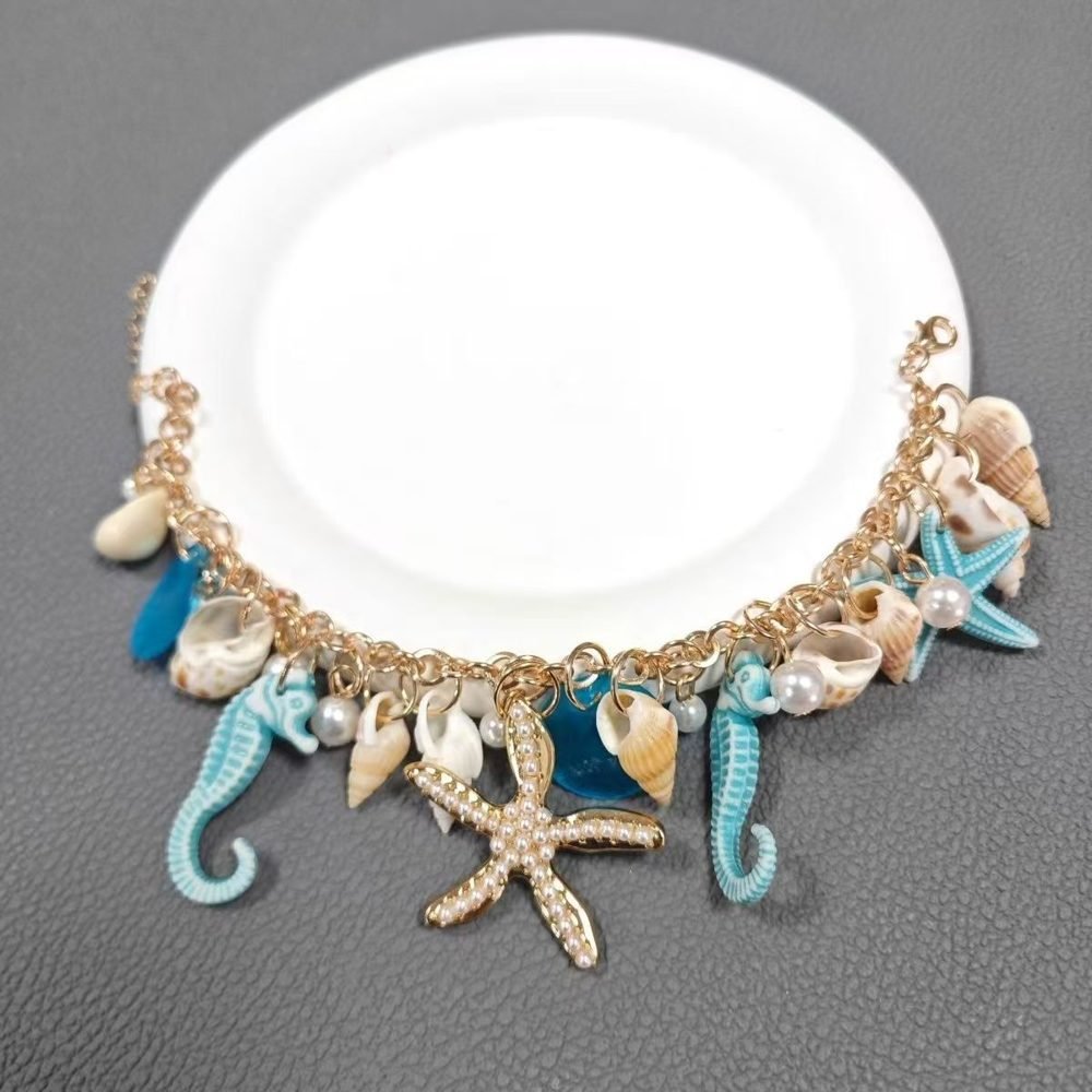 Sutyen turquoise ocean charm statement necklace